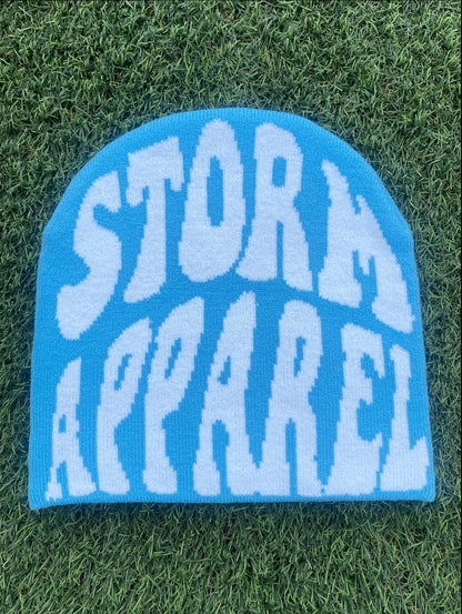 BLUE AND WHITE STORM APPAREL BEANIE.